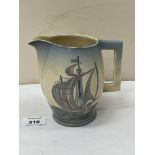 An Art-Deco Carlton Ware jug, painted with two sailing ships on a rolling sea. 5½' high. Two chips
