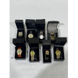Eight gentleman's wristwatches. Electronic movements. Boxed