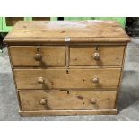 A Victorian pine chest of two short over two long drawers on plinth support. 35' wide