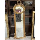 A gilt framed pier glass in French style. Of recent manufacture. 57' high