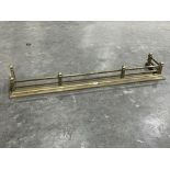 A brass rail fender. 58' wide