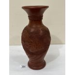 An early 20th century Japanese Tokoname red clay dragon vase. 12' high. Chip to rim and foot