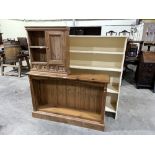 A pine open bookcase; a pine wall cabinet and painted shelves (3)