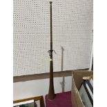 A copper hunting horn. 36' long