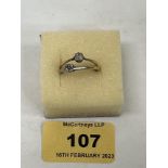 Two 18ct diamond solitaire rings. 4g gross