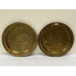 Two 19th century brass tray chargers. 17¾' and 18' diam.