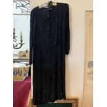 An early 20th century black chiffon and sequined cocktail dress