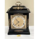 A Georgian style bracket clock in ebonised case, the three train movement by F.W. Elliott Ltd with