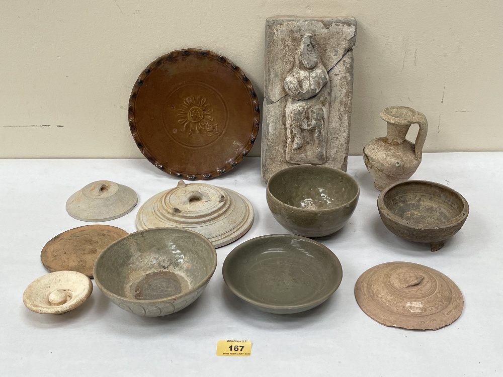 A collection of ancient pottery to include celadon glazed wares