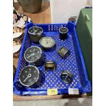 A box of automotive instruments to include a Smiths car clock