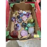 A box of glass paperweights