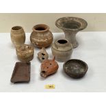 A collection of ancient pottery from Mesopotania, Africa, China and other origins. The lot to