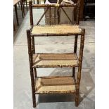 A bamboo and caned etagere. Late 19th century. 20'w x 44½'h