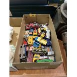 A box of playworn Dinky, Matchbox diecast model vehicles