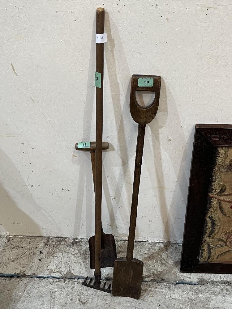 Three vintage children's beach tools