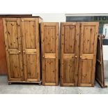 A suite of modern pine bedroom furniture to comprise two wardrobes; two chests of drawers and a