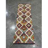 A Choli Kilim carpet runner. 2m x 0.6m