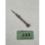 A Victorian 9ct propelling toothpick with hardstone seal terminal. 2½' long extended