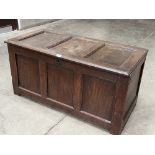 An early 18th century joined oak three panel chest. The sides and back panelled. 44' wide