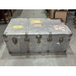 A vintage metal cabin trunk