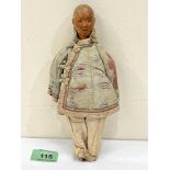 A Door of Hope Mission doll, carved wood head with painted hair, human hair queue, cloth body with