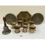 A collection of 18th and 19th century bronze and brass mortars, trays and handbell