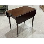 A 19th century mahogany Pembroke table with frieze drawer on turned tapered legs. 31' wide