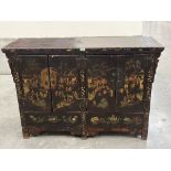 An 18th/19th century northern Chinese Shanxi lacquered cabinet enclosed by two pairs of doors,