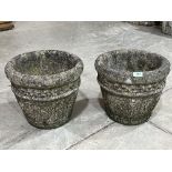 A pair of moulded garden vases. 13' diam x 12' high