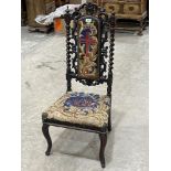 A Victorian Carolean style walnut side chair, the scroll carved back with barleytwist columns