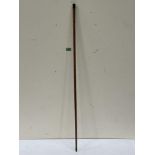 A walking cane or dipper with measuring scale to the shaft. 42' long