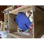 Two boxes of patchwork and other textiles
