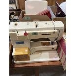A Bernina Record sewing machine with accessories