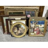 A collection of framed pictures
