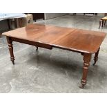 A Victorian mahogany dining table on turned legs, 70' long with one extra leaf; the lot to include