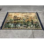 A rug or wall hanging depicting a lion. 49' x 73'