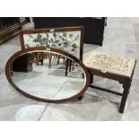 A mahogany stool with woolwork seat; an oval mahogany wall mirror and an embroidered mahogany