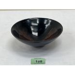 A Chinese leaf bowl, the two leaves set in a dark brown glaze. 5¾' diam