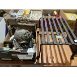 A box of metalware and a footman