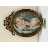 A 19th century portrait miniature of a lady in gilt metal frame. The work 4' x 3¼' oval