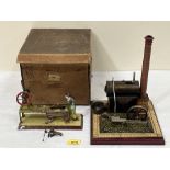A Gebruder Bing live steam engine, c.1910; the single cylinder horizonal engine with printed