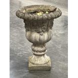 A campana garden urn. 27' high