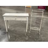 A wrought metal towel rail and a painted side table