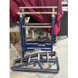 A pair of axle stands and a pair of folding metal stands