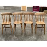 A set of four lath-back kitchen chairs