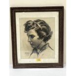 IGNATIO AGUDO CLARA. SPANISH 1880-1966 Portrait of a young lady. Signed and dated 1957. Conte crayon