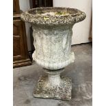 A campana garden urn, moulded in relief with classical figure scenes. 25' diam x 36' high