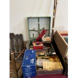 A collection of fishing equipment including two split cane rods, reels, flies, floats etc.