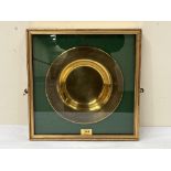 A framed brass ceremonial dish, presented by the Sunday School children of the 1st Bn. The King's