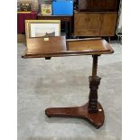 A Victorian mahogany over bed reading stand bearing trade label for Alfred Carter, London